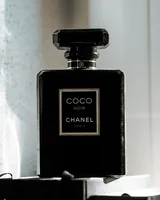 Sovereign woody amber fragrance bottle - close-up view